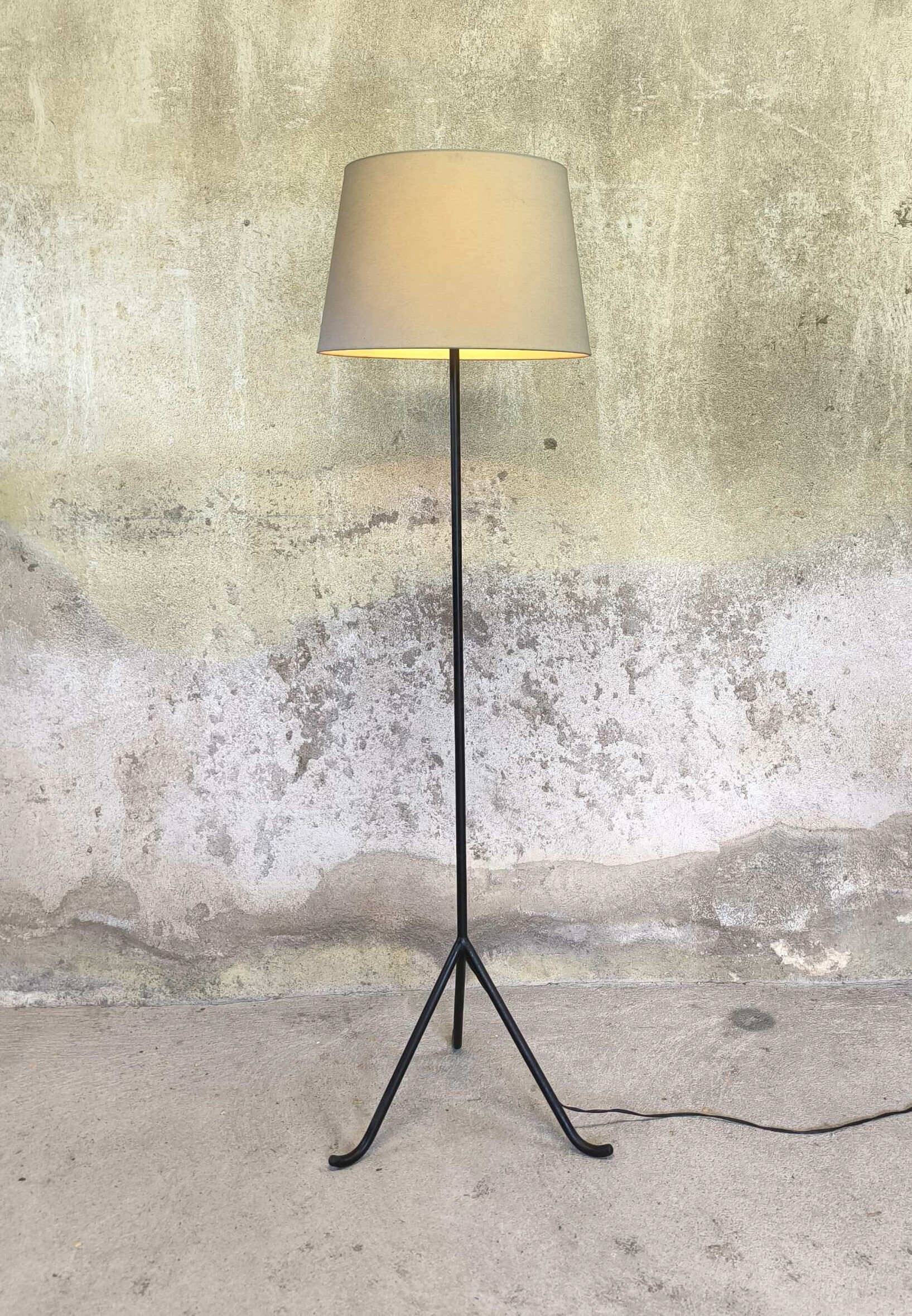 Vintage modernist tripod floor lamp.