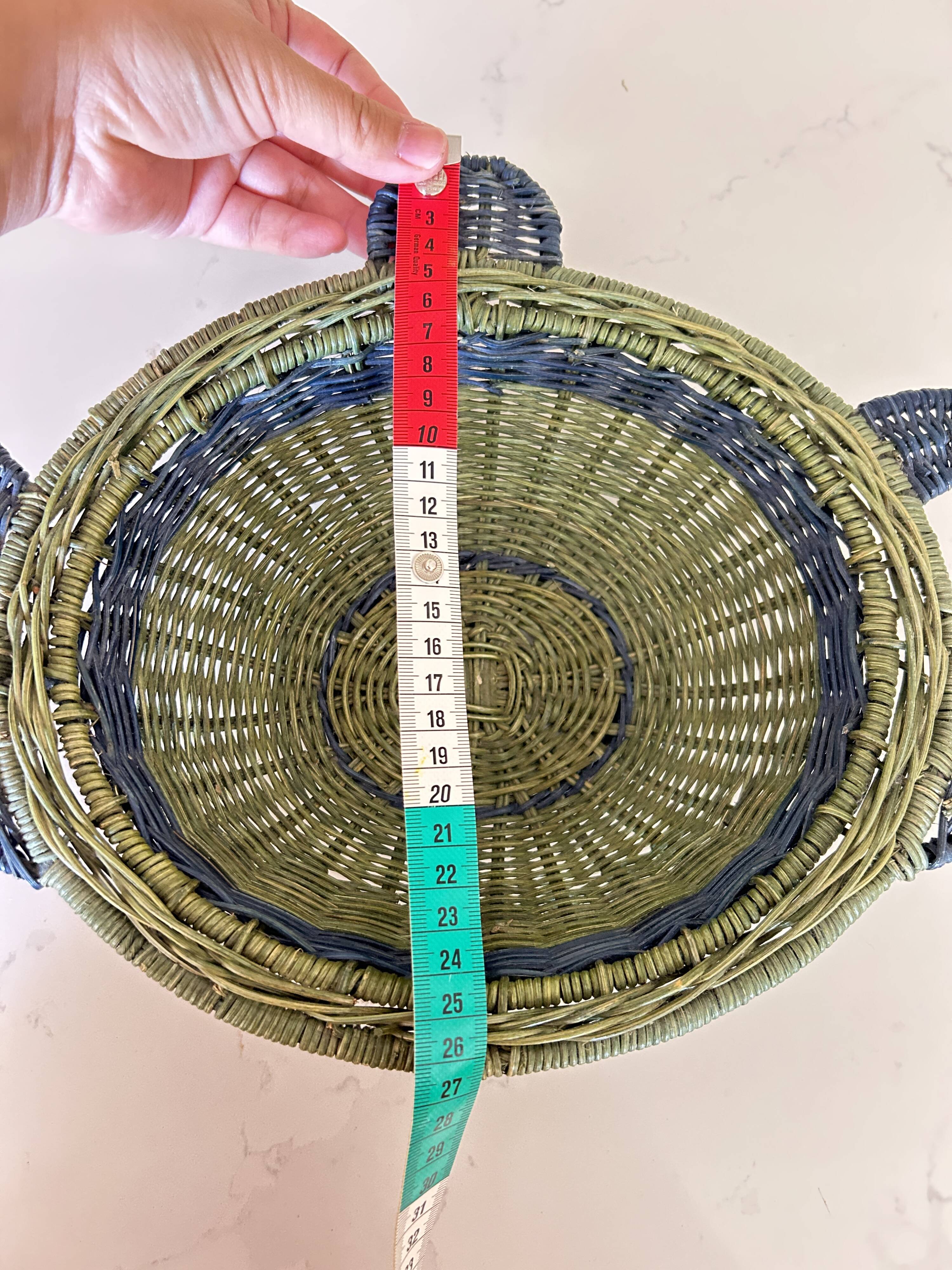 Rattan basket in the shape of a teapot.