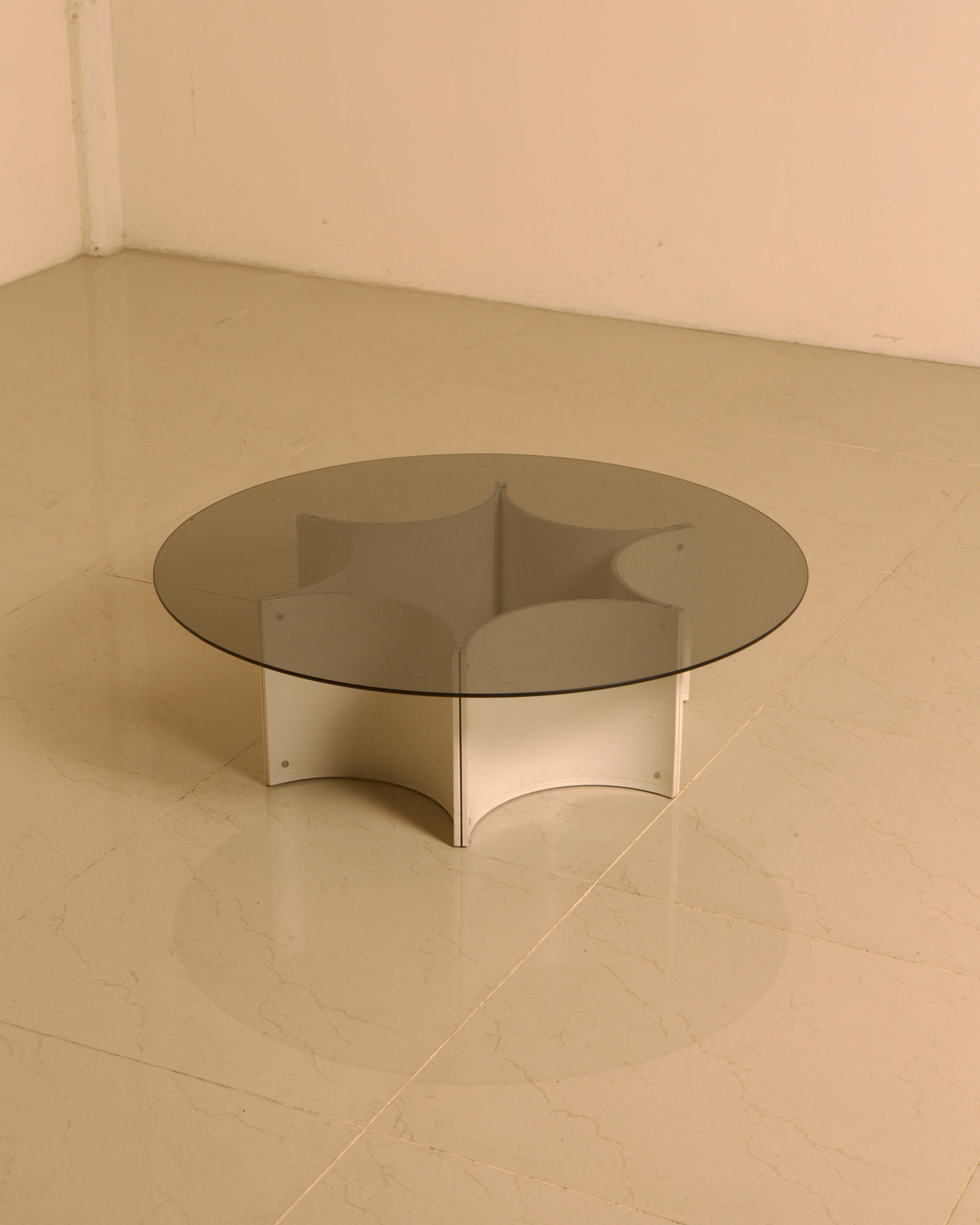 "Space Age" coffee table with star base and smoked glass top from the 70s.