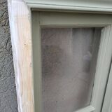 Old window mounted as a fenestron
