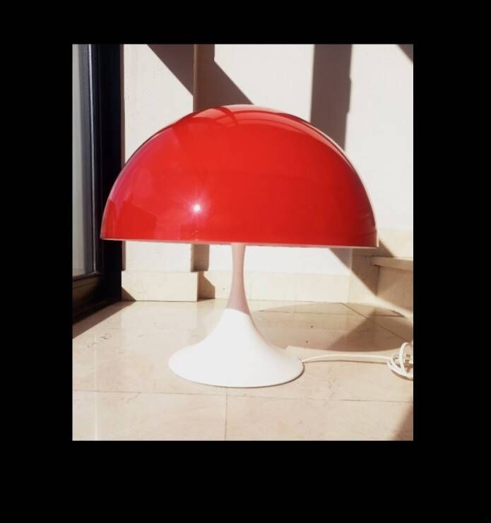 Two Miguel Milá lamps