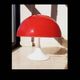 Two Miguel Milá lamps