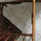 Faux bamboo chair with cushion