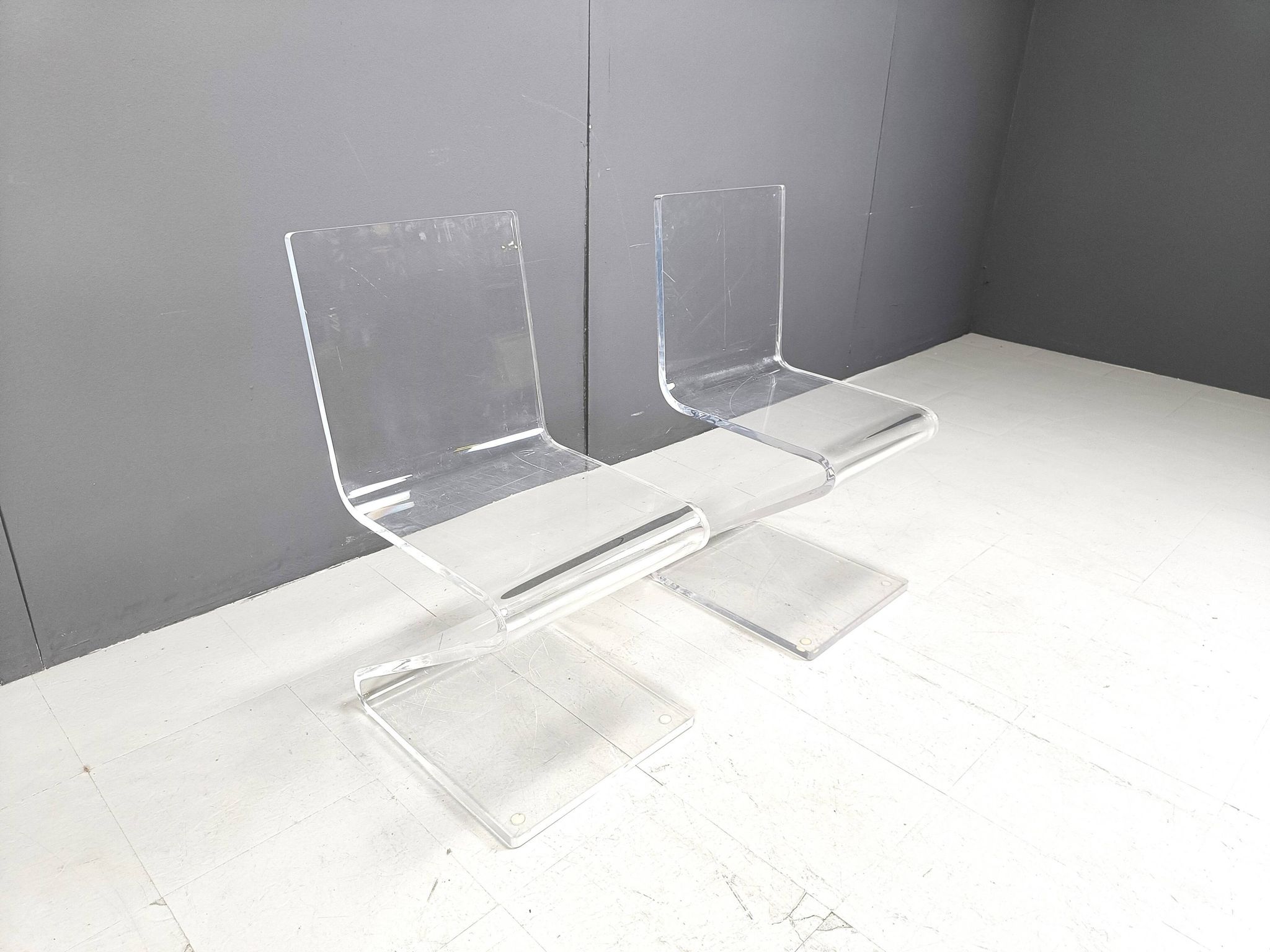 Pair of lucite zigzag dining chairs, 1980s