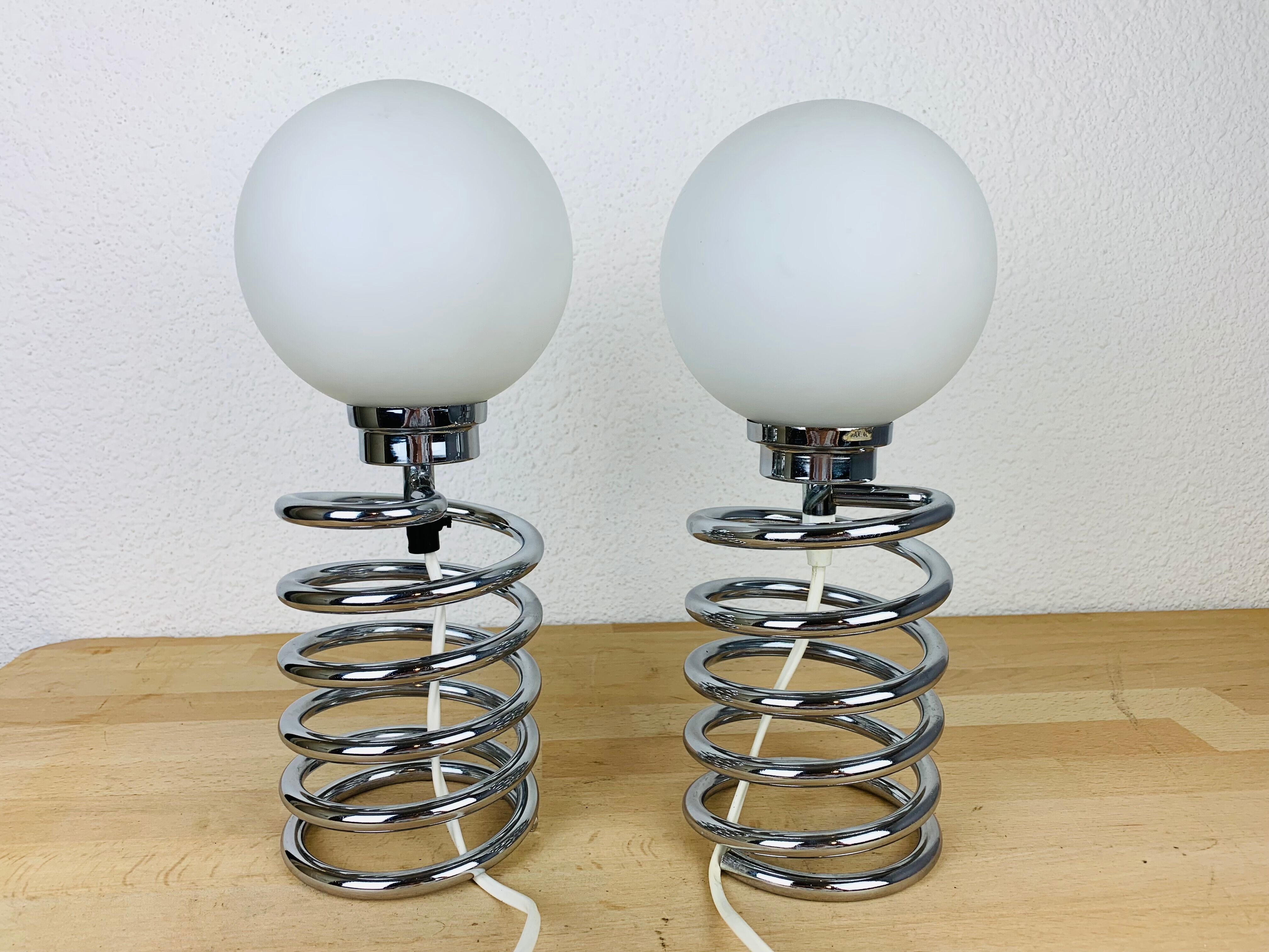Pair of lamps spring chrome 70s