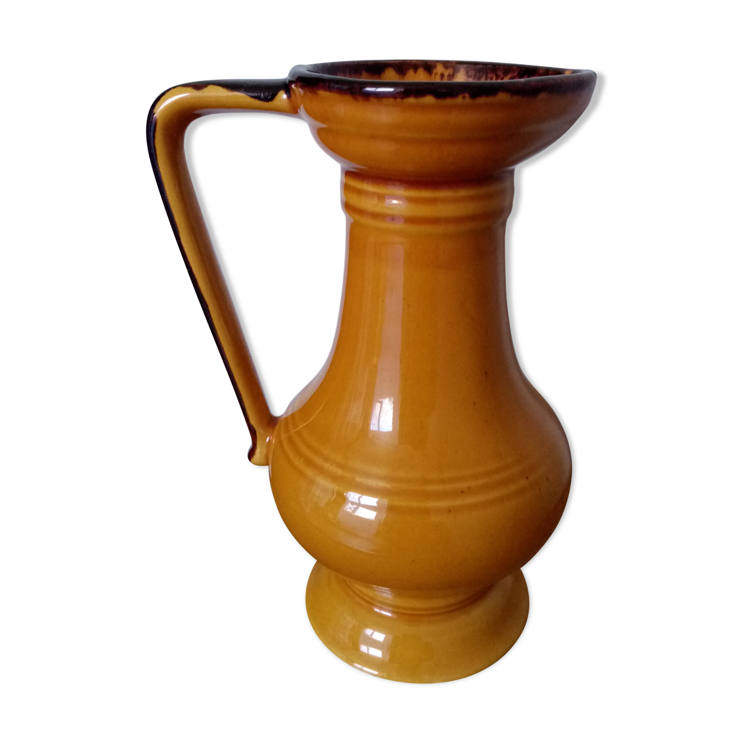 Mustard yellow enamelled ceramic pitcher