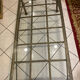 Table basse en fer et plateau en verre