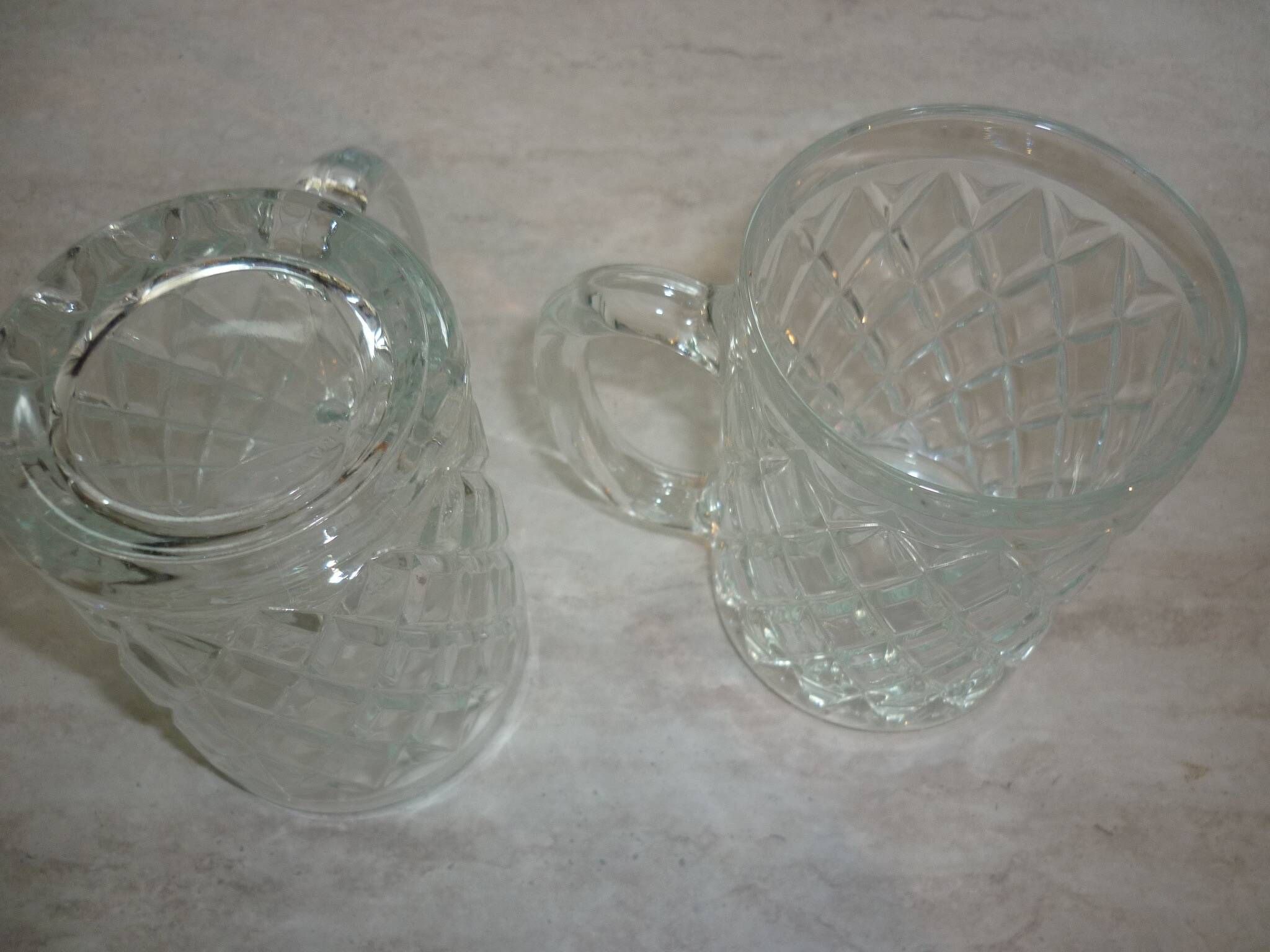 2 diamond-shaped glass beer mugs/glasses