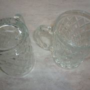2 diamond-shaped glass beer mugs/glasses