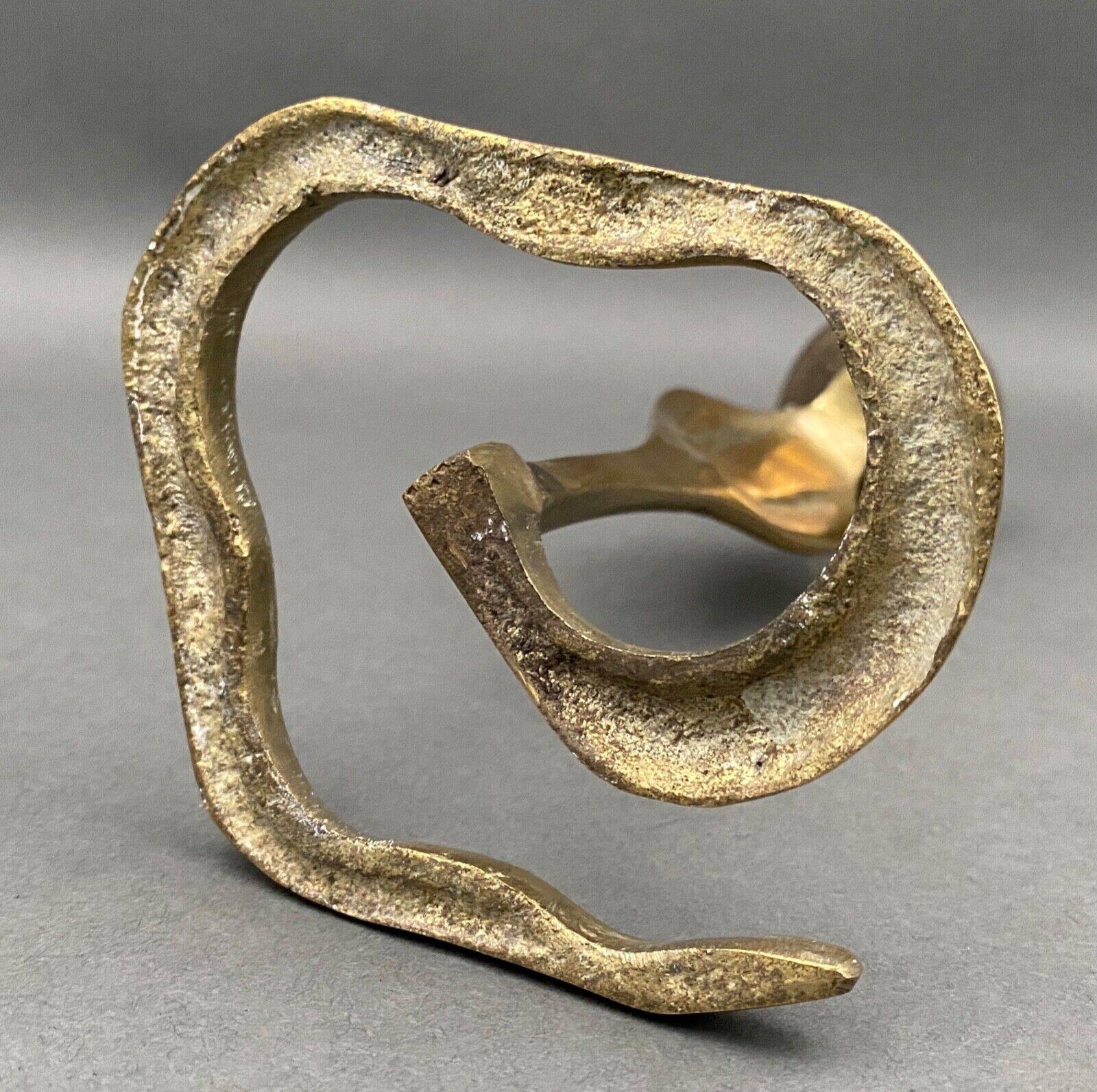 Bougeoir en bronze décor de cobra milieu XXe