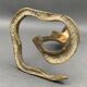 Bougeoir en bronze décor de cobra milieu XXe