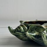 Green shell-shaped ashtray.