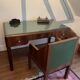 Rosewood desk, armchair and bookshelf.