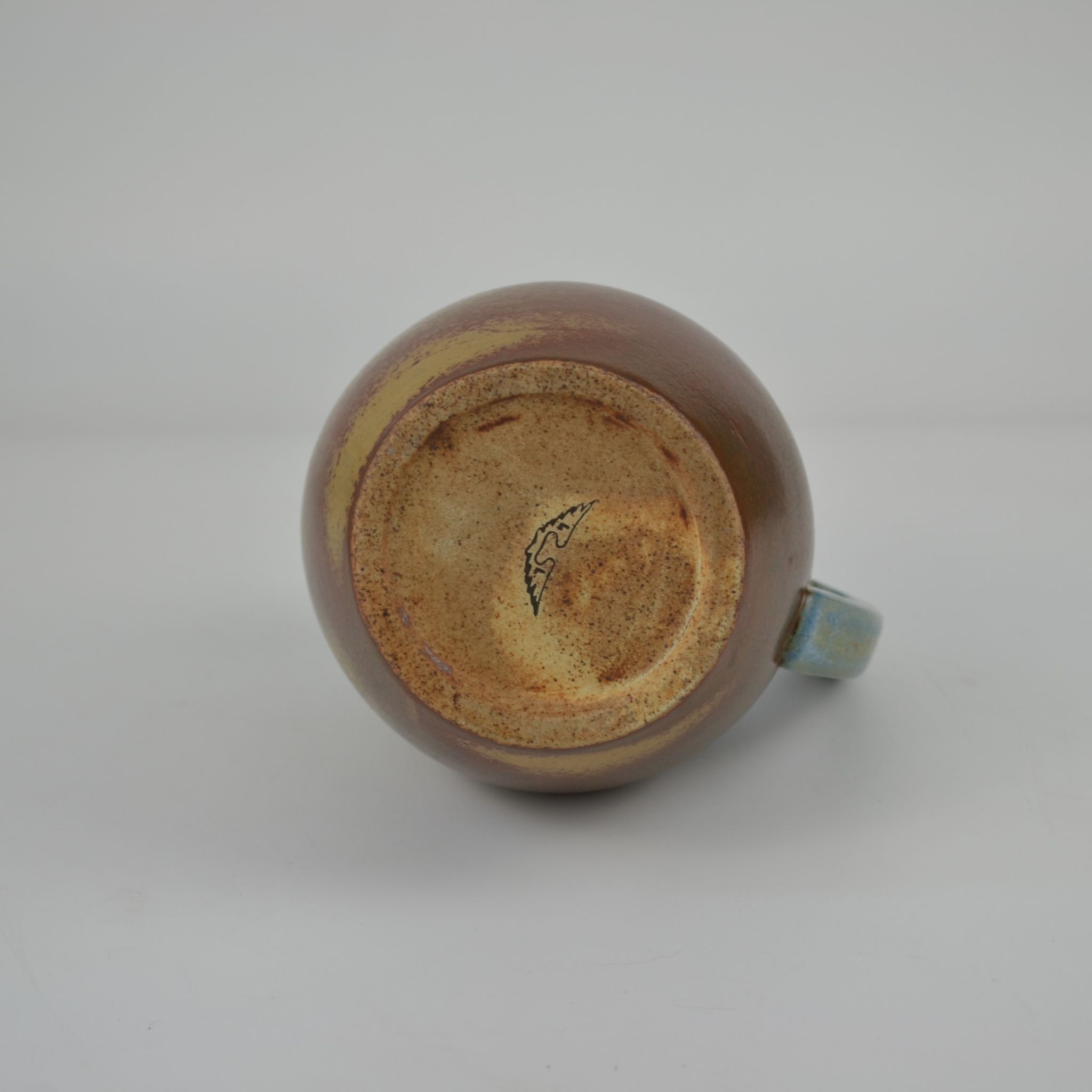 Two-tone stoneware pitcher by Louis Lourioux