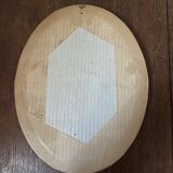 Classic oval mirror in gilded wood.