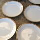 Set of 6 flat plates in Foëcy porcelain with golden epi border
