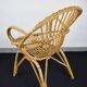 Fauteuil en osier enfant avec coussin orange