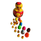 Chicken with eggs and chicks