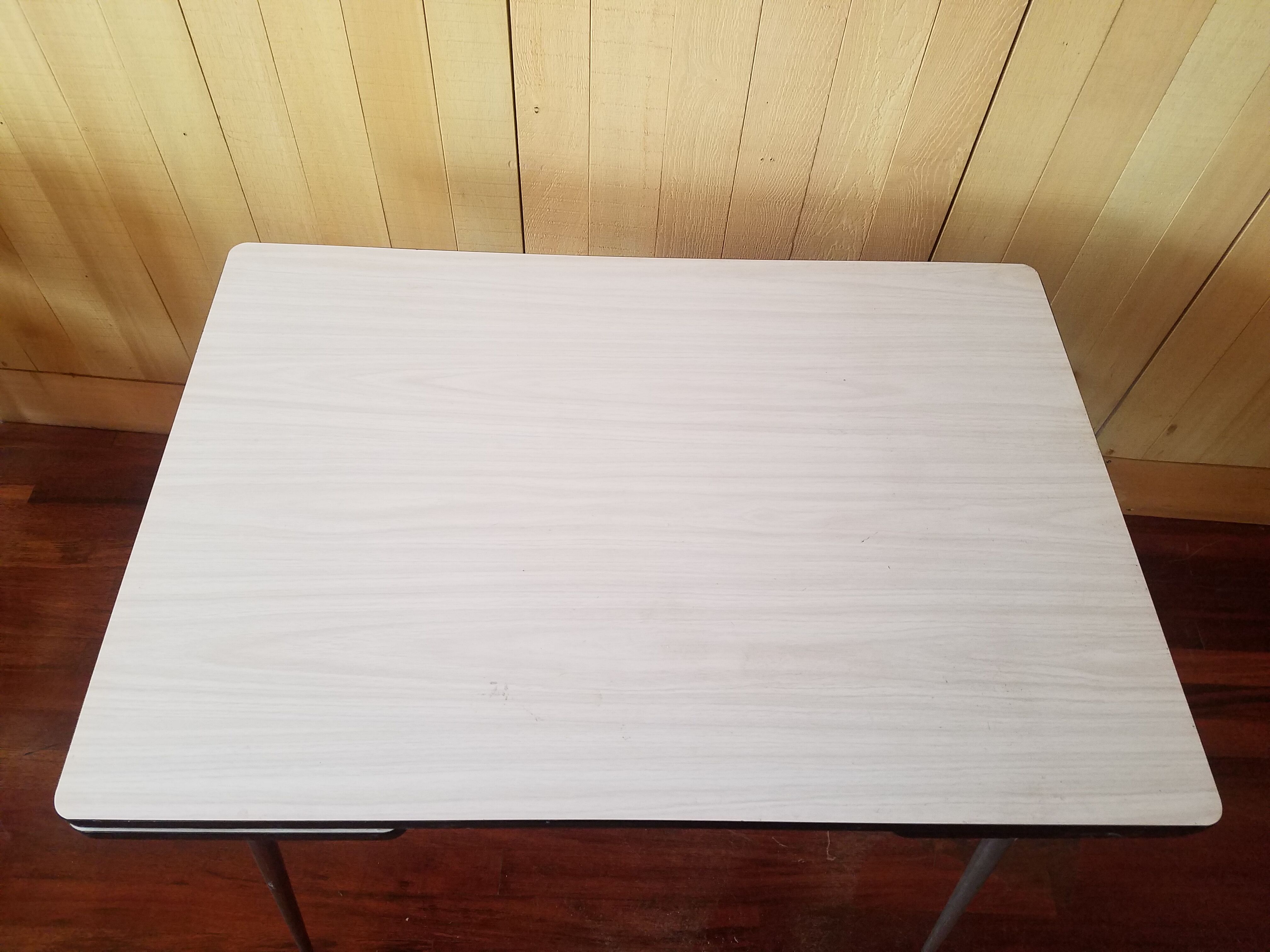 Old vintage 1965 white formica kitchen table