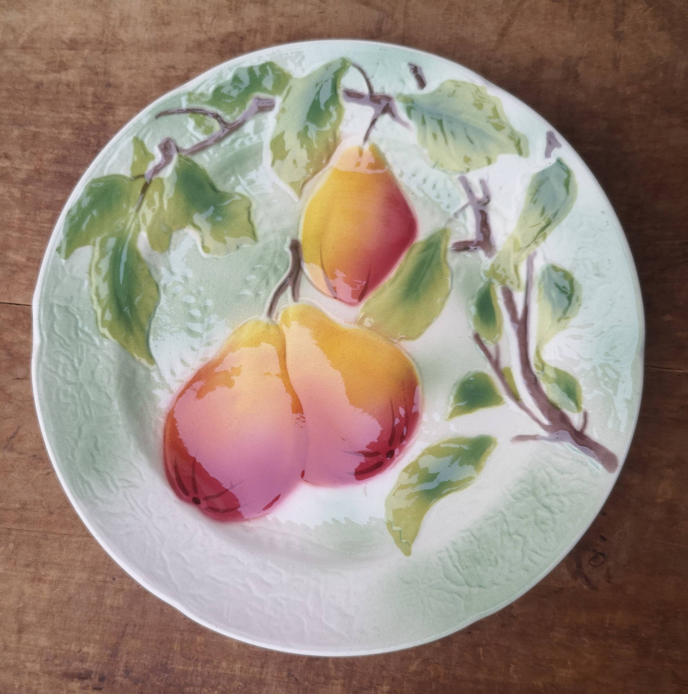 Old dessert plate in barbotine, St Clément factory