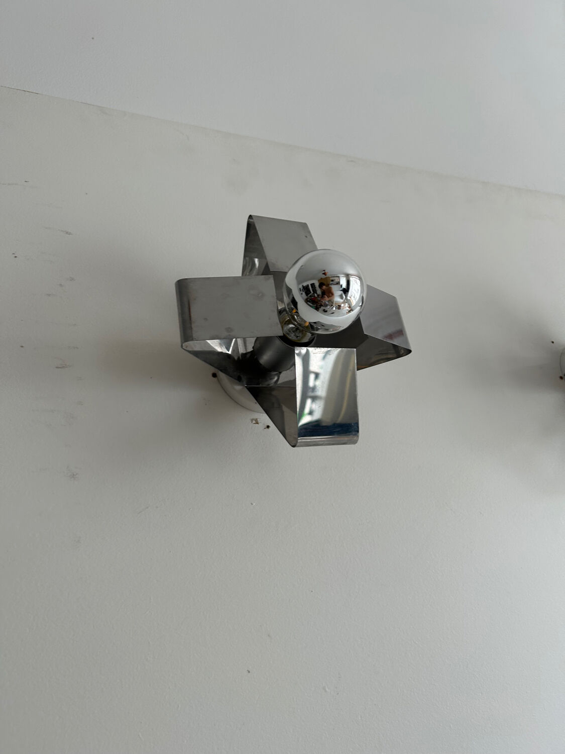 Pair of wall lamps in chromed metal France 1970