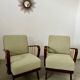 Set 2 old designer fireside chairs from the 50s wood and vintage fabric
