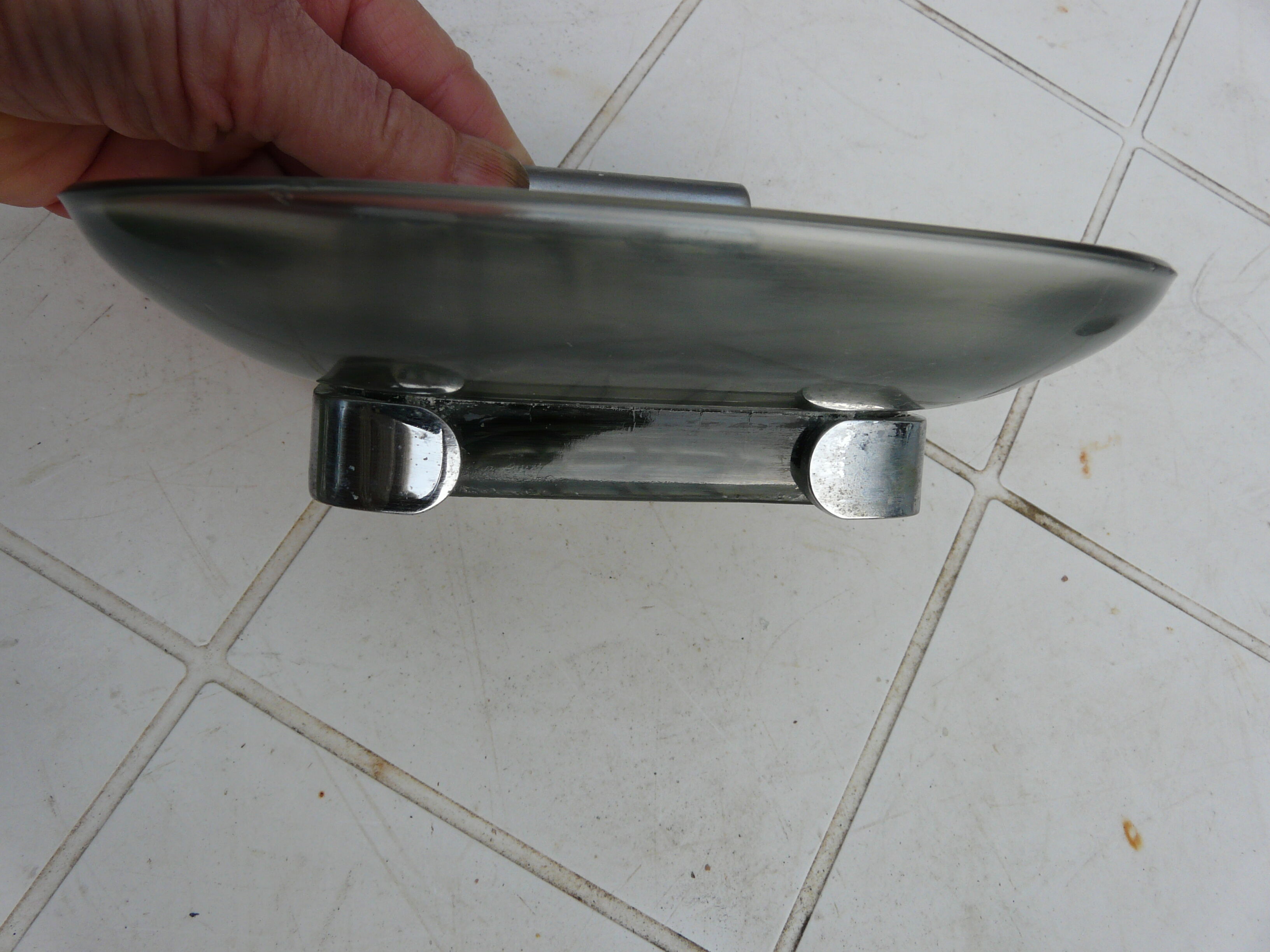 Chrome metal soap holder and smoked glass bathroom accessory