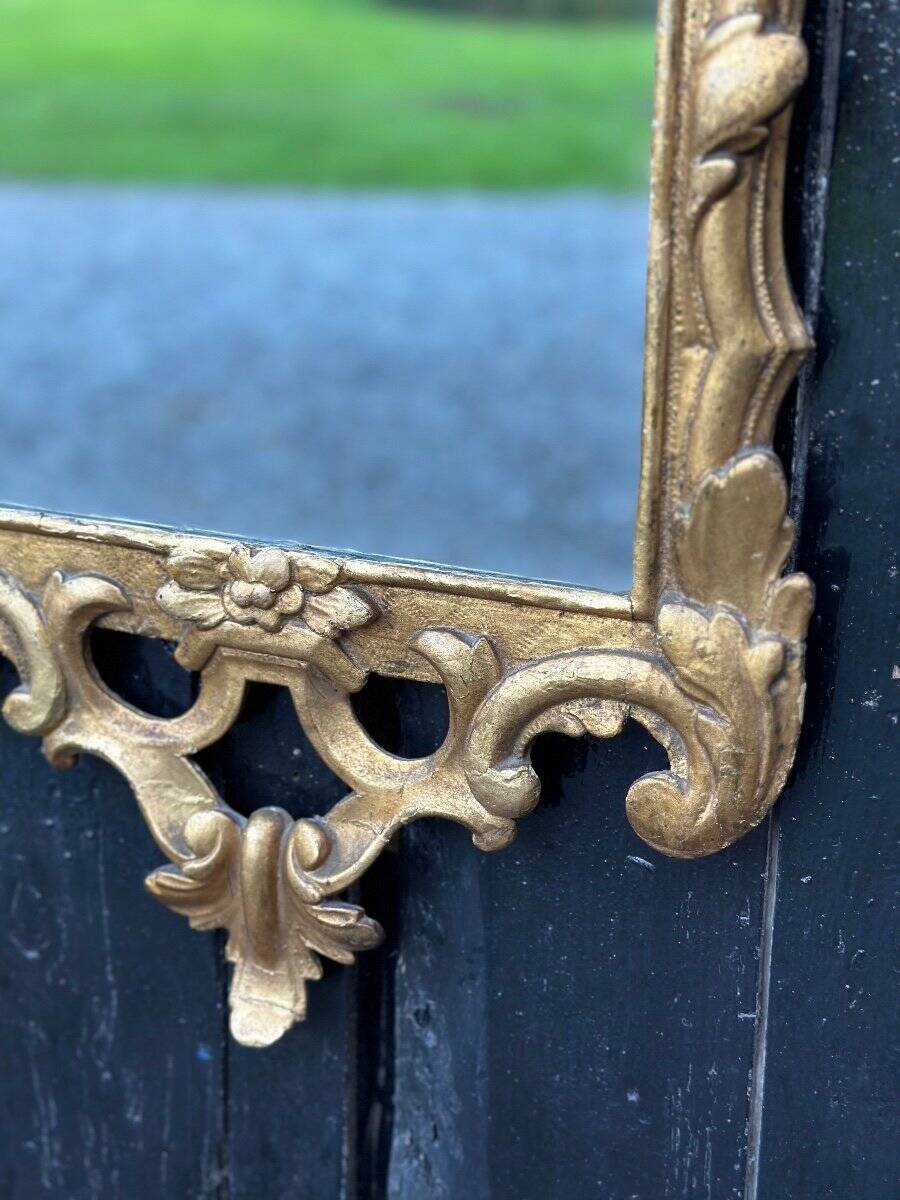 Carved and gilded wooden mirror, late 18th century
