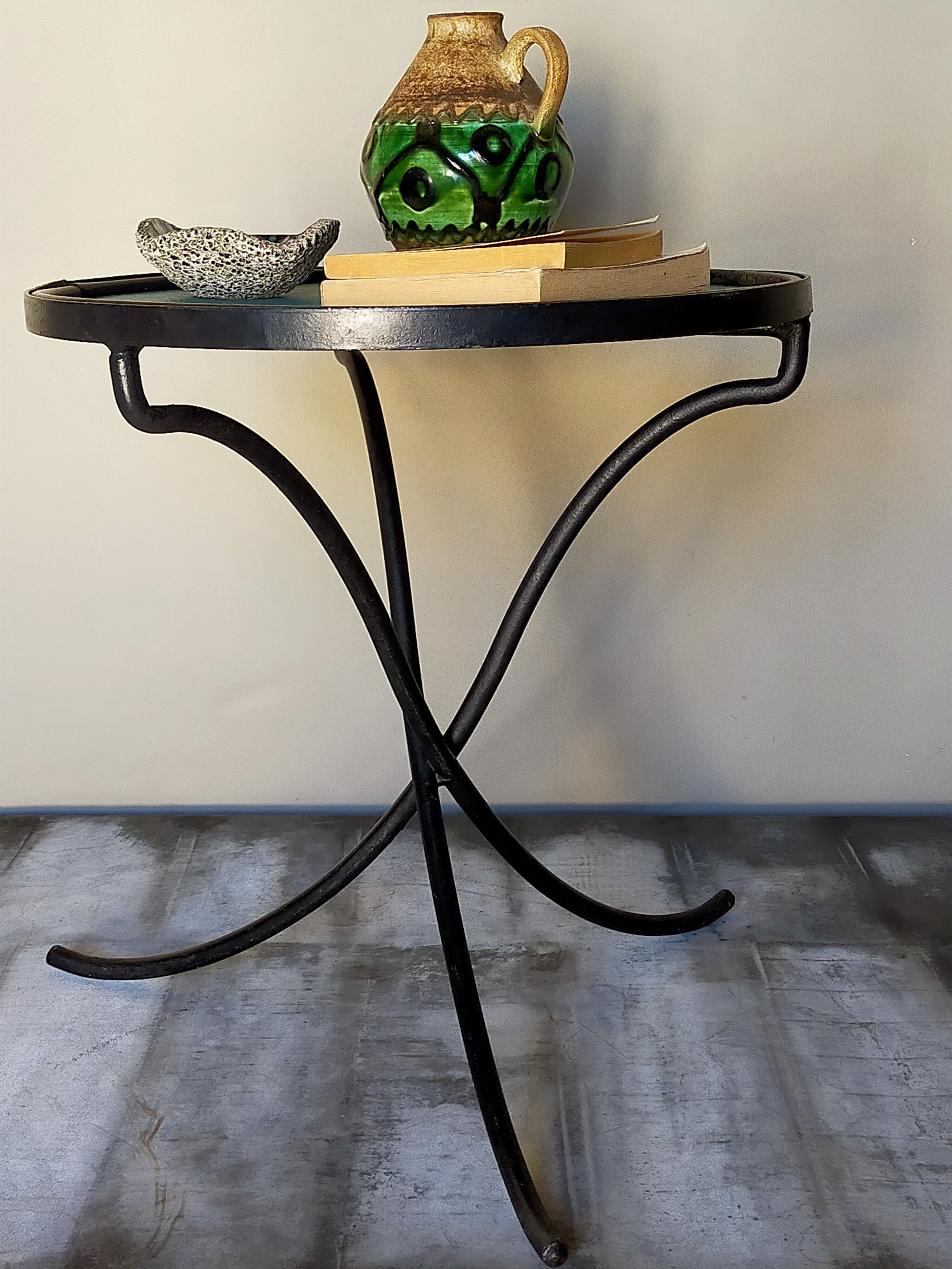 Wrought iron tripod healing in the 1950s