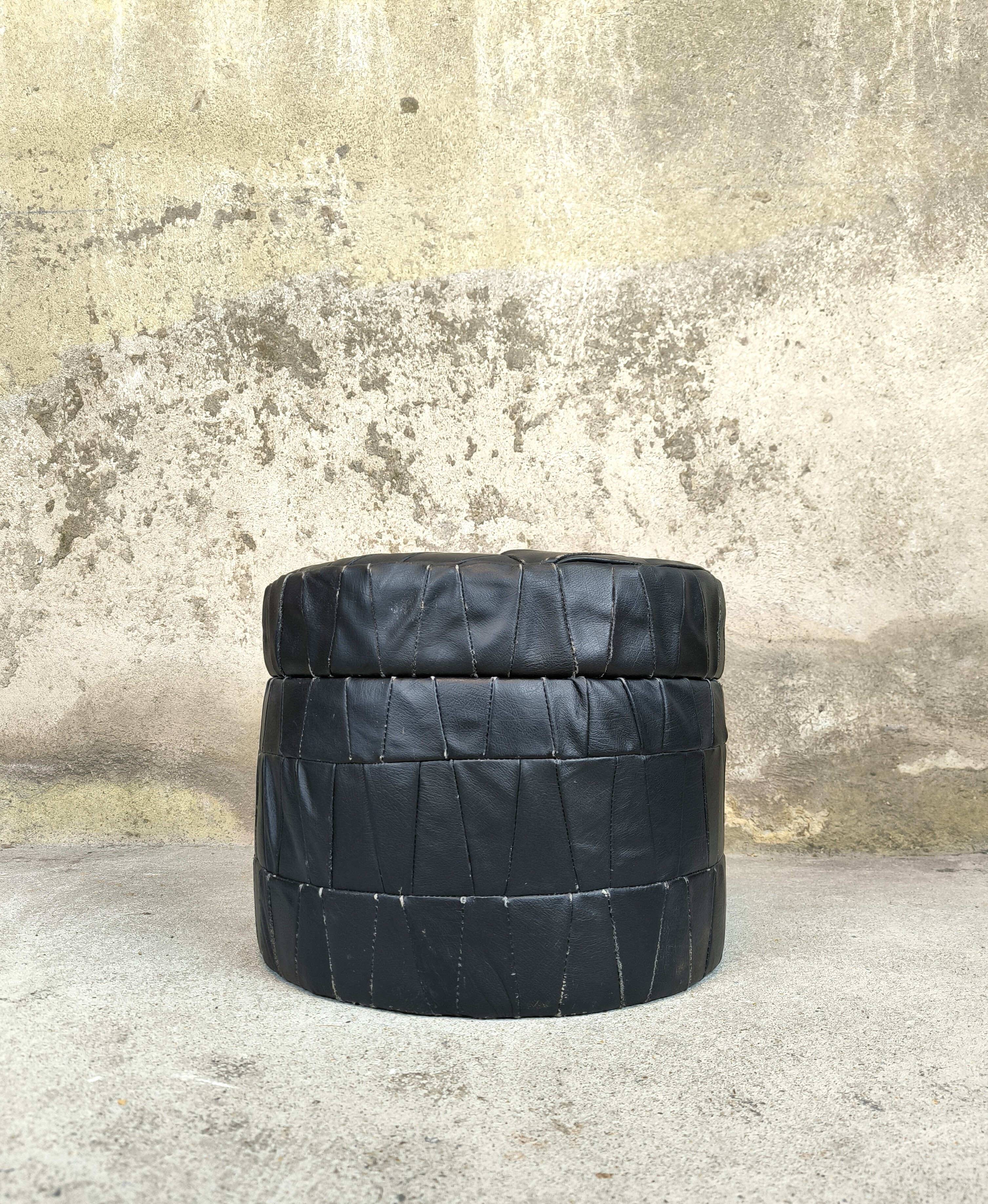 Vintage De Sede black leather storage pouf.