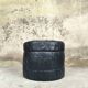 Vintage De Sede black leather storage pouf.