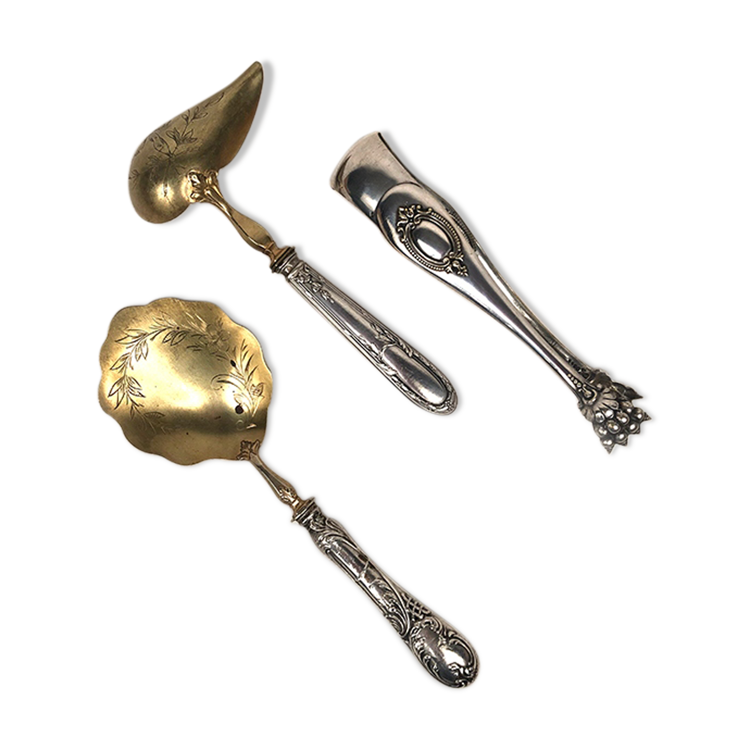 Set of three silver metal service cutlery