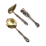 Set of three silver metal service cutlery