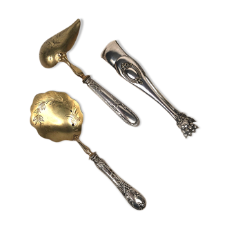 Set of three silver metal service cutlery