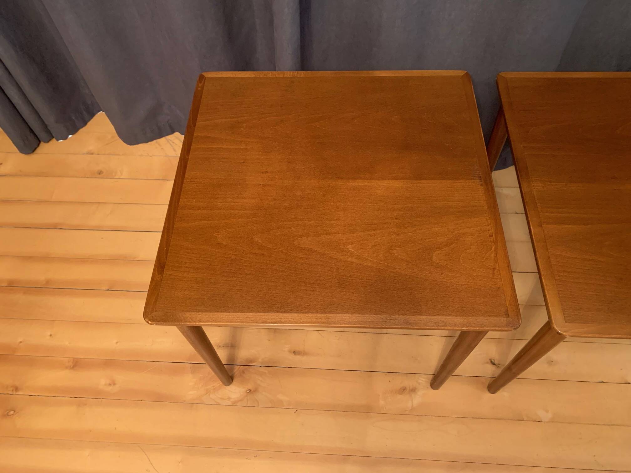 Pair of mahogany side tables, Denmark, 1950s.