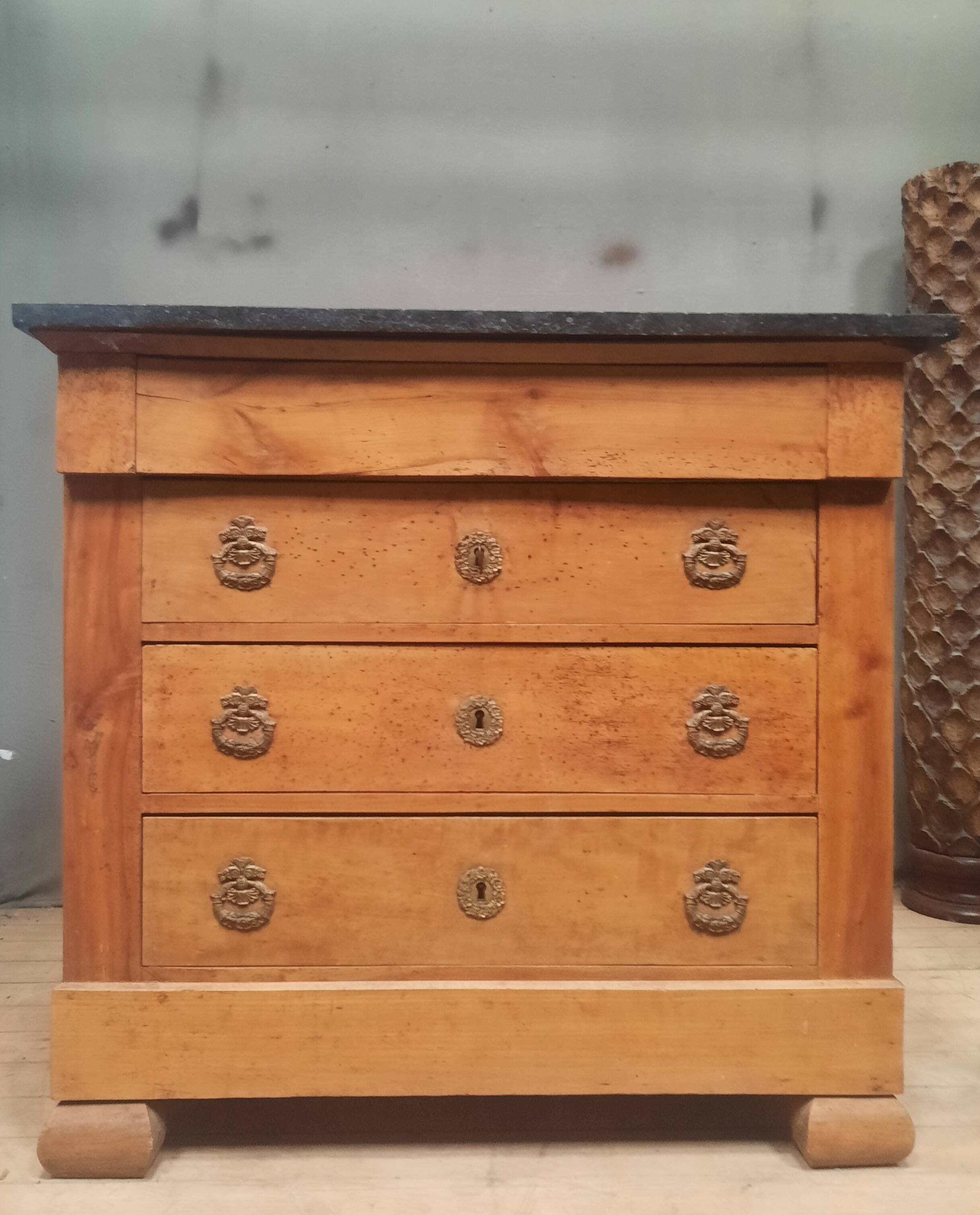 Nineteenth-century commode with marble top.