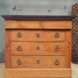 Nineteenth-century commode with marble top.