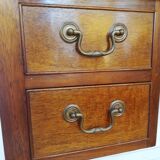 English wooden desk on top of leather