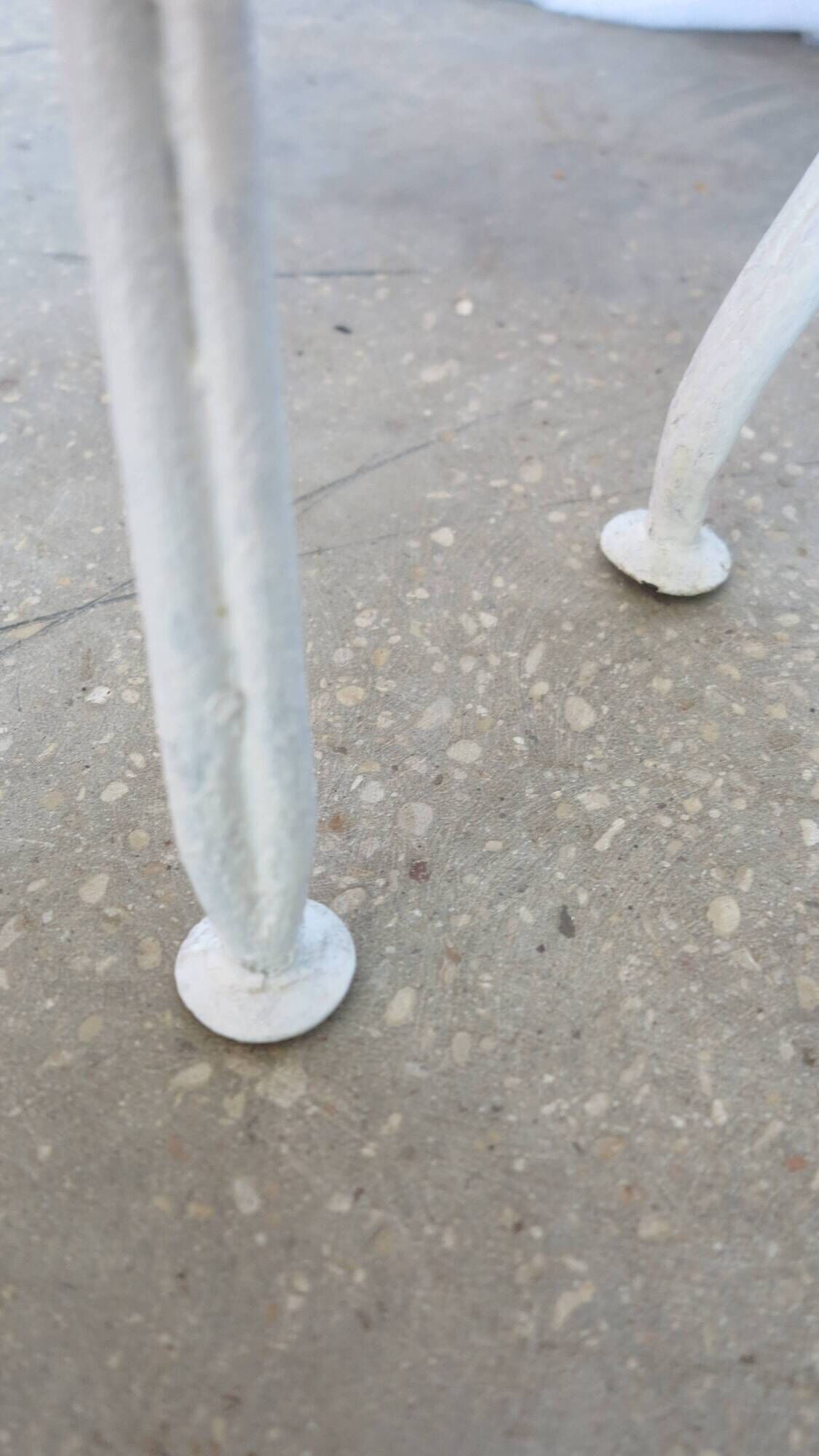 Pair of antique garden chairs, wrought iron, white paint.