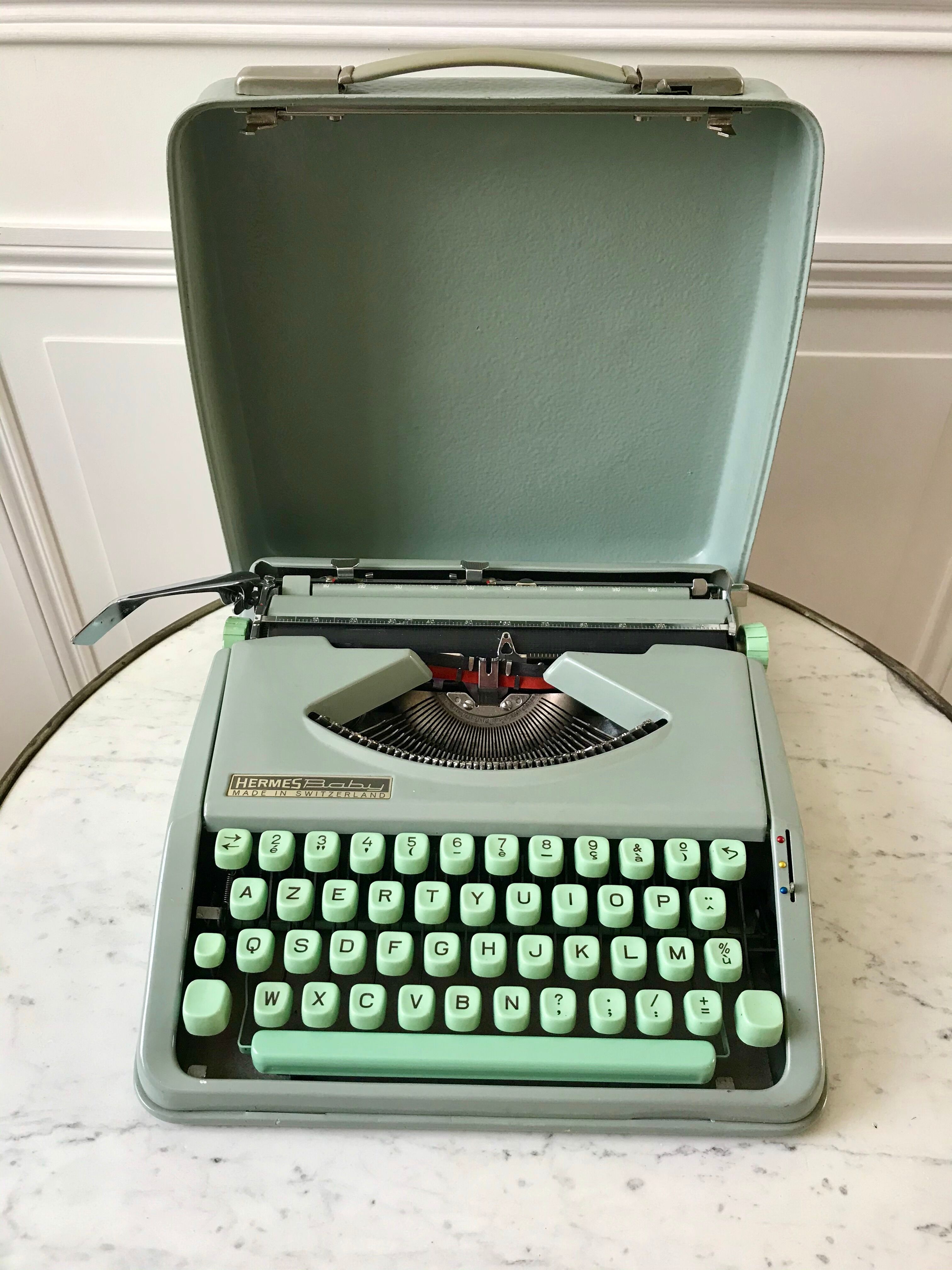 Mint green typewriter hermes baby made in switzerland