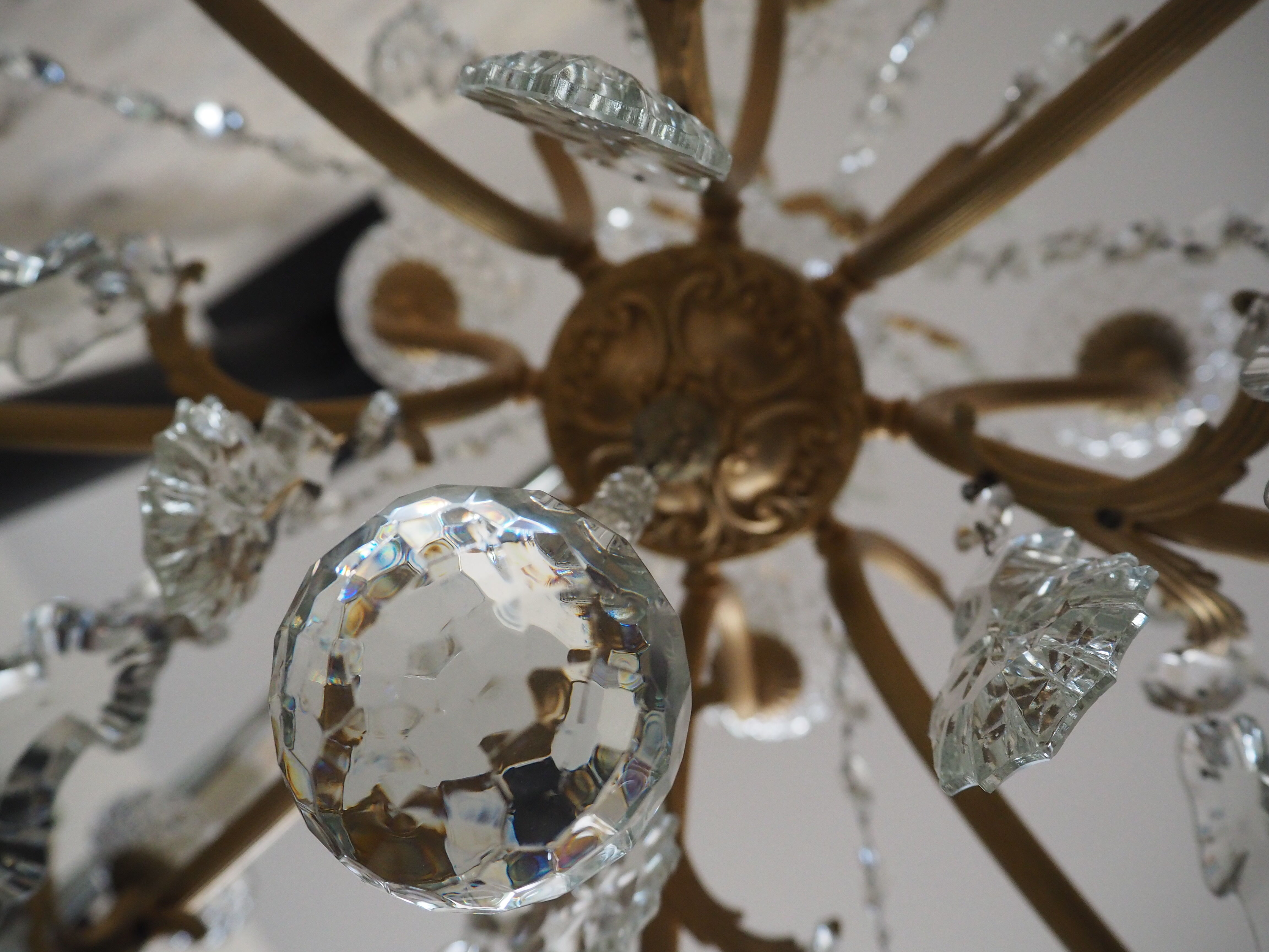 Chandelier 12 lamps with grapevines in crystal, bronze and regulated