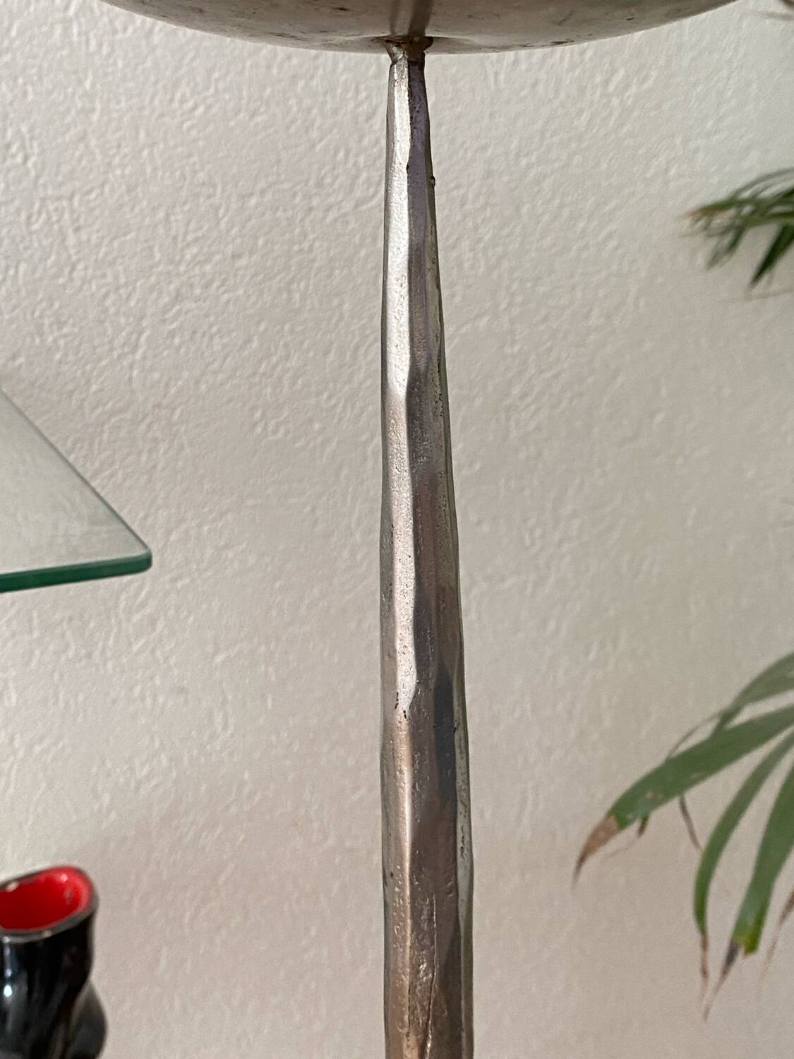 Large silver-plated candlestick on a stand