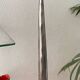 Large silver-plated candlestick on a stand