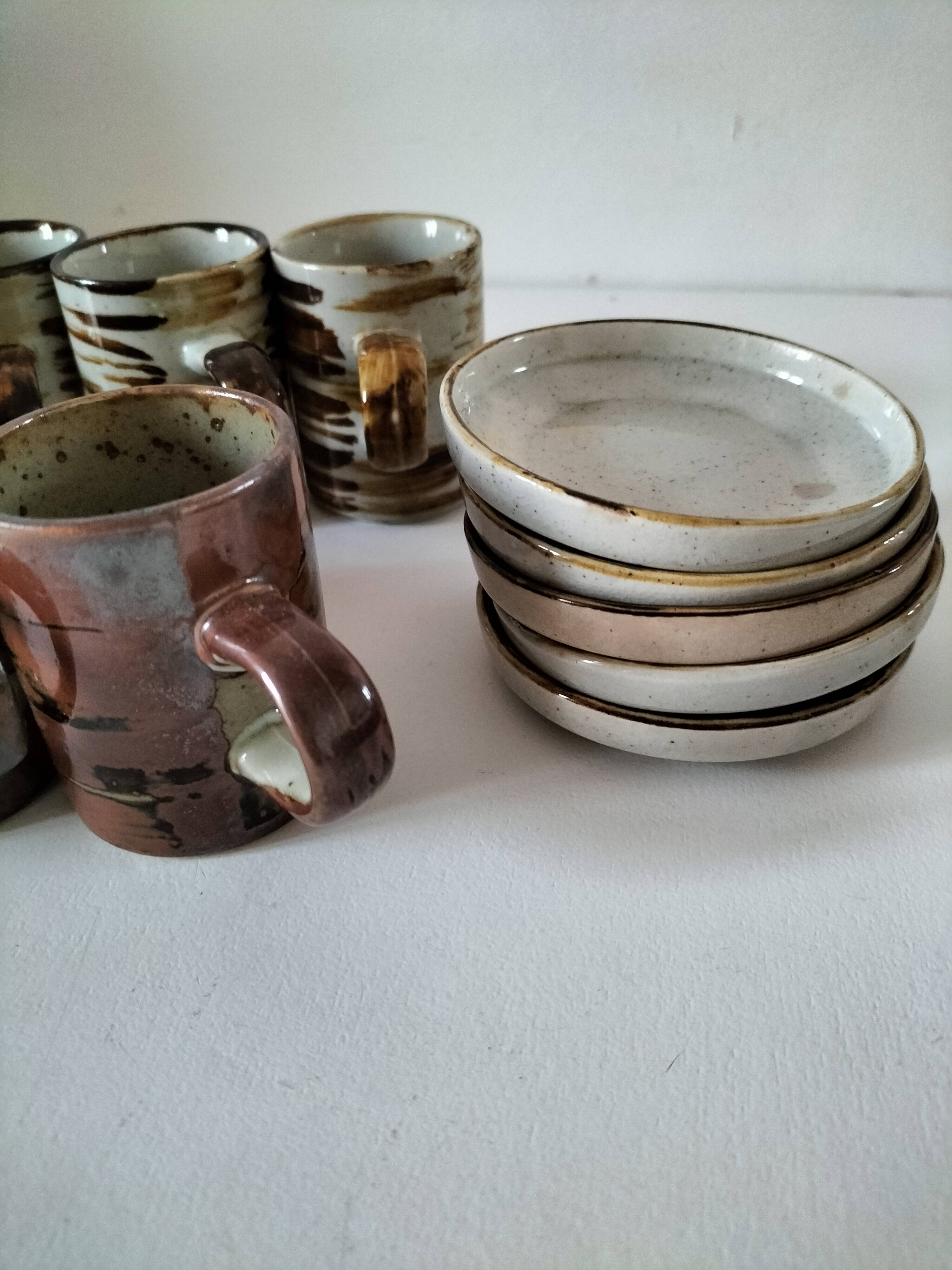 Set of rustic stoneware with 10 cups and 5 saucers from the 1970s.