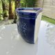 Wall pot in glazed blue terracotta with a grape motif, 1970s.