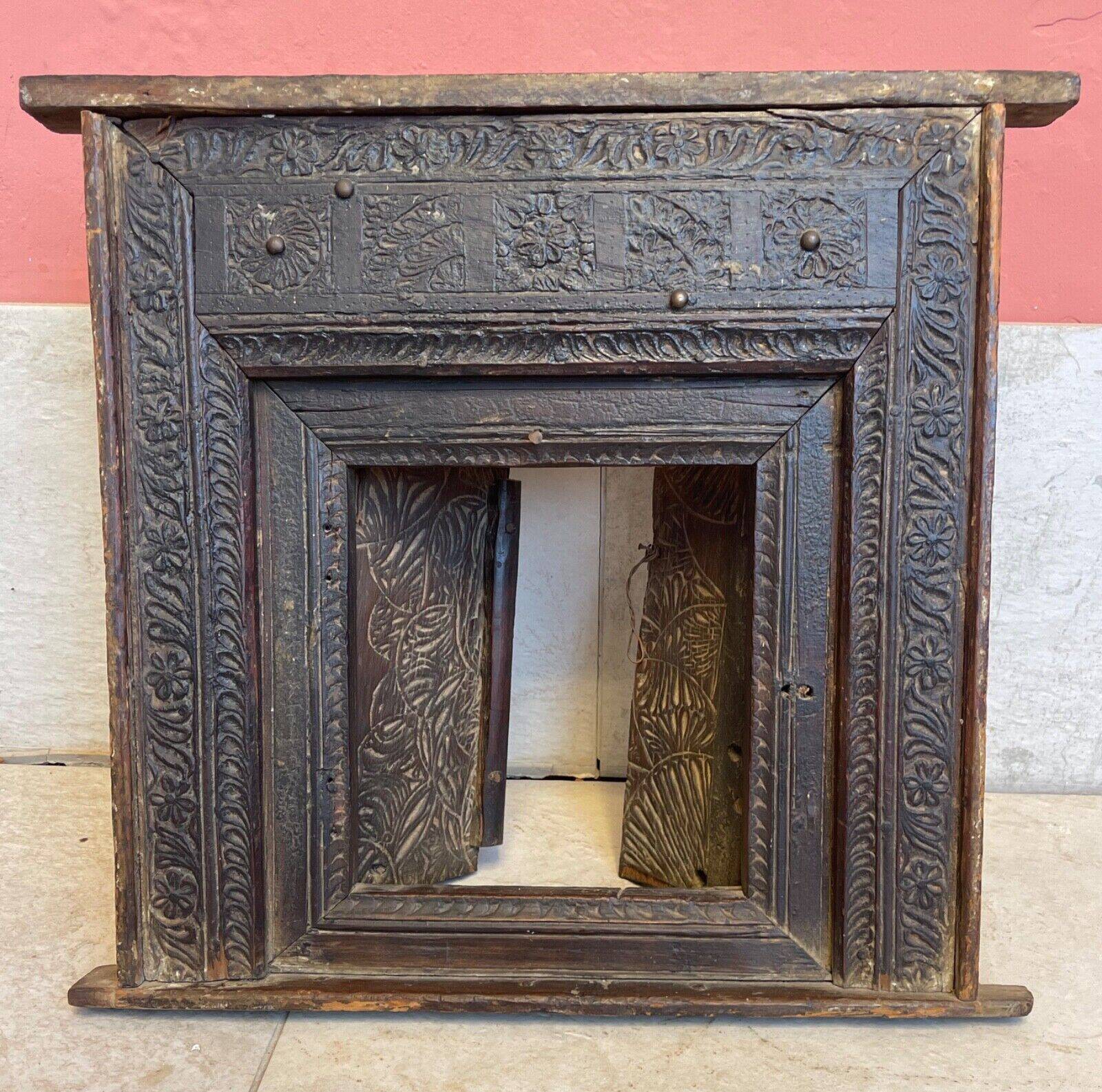 Old Indian window with carved decoration of flowers and foliage 19th century