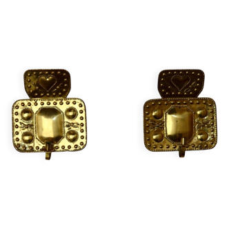 A pair of mid-century Swedish brass wall lights.