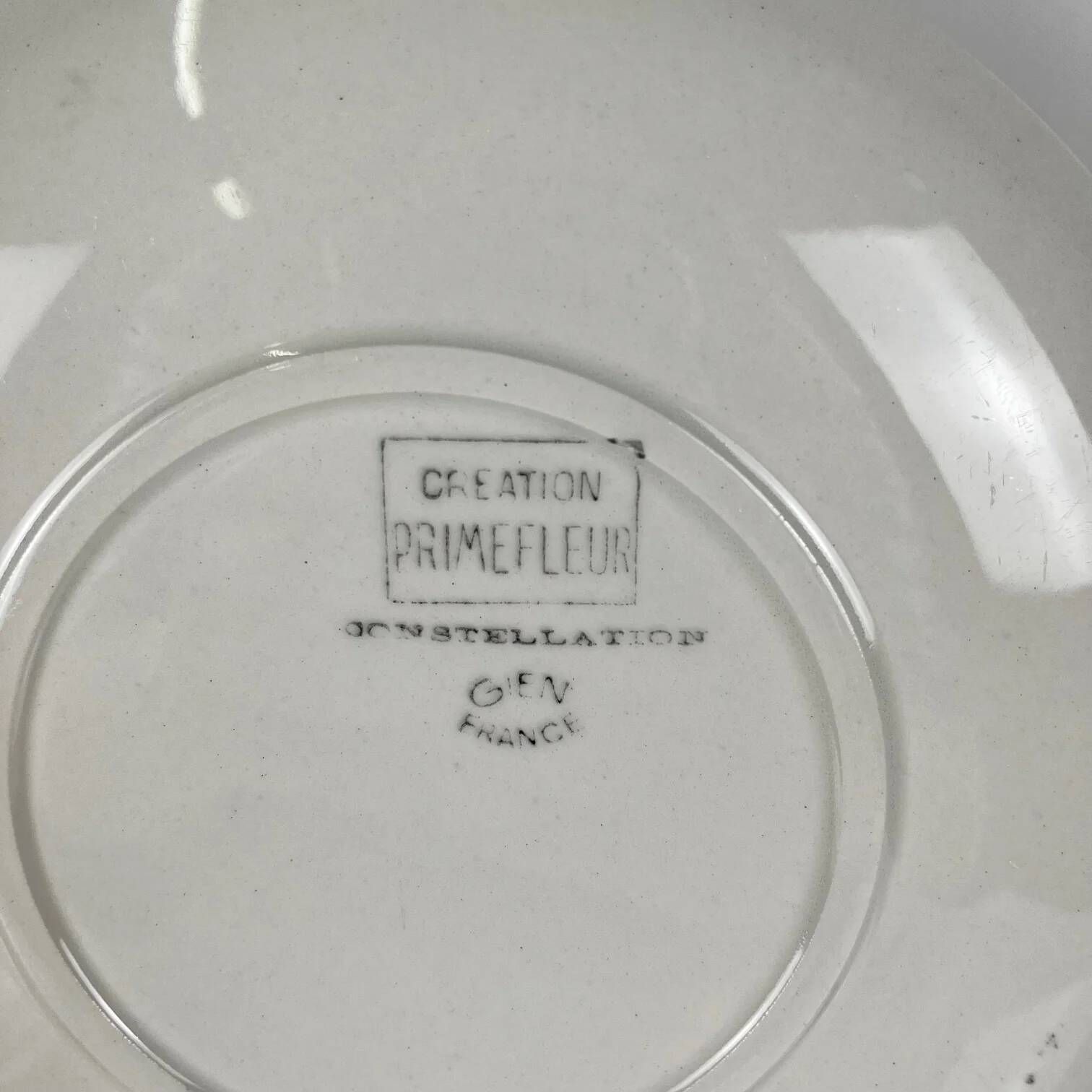 Set of 4 dessert plates GIEN, Primefleur creation, model "Constellation", 1950.