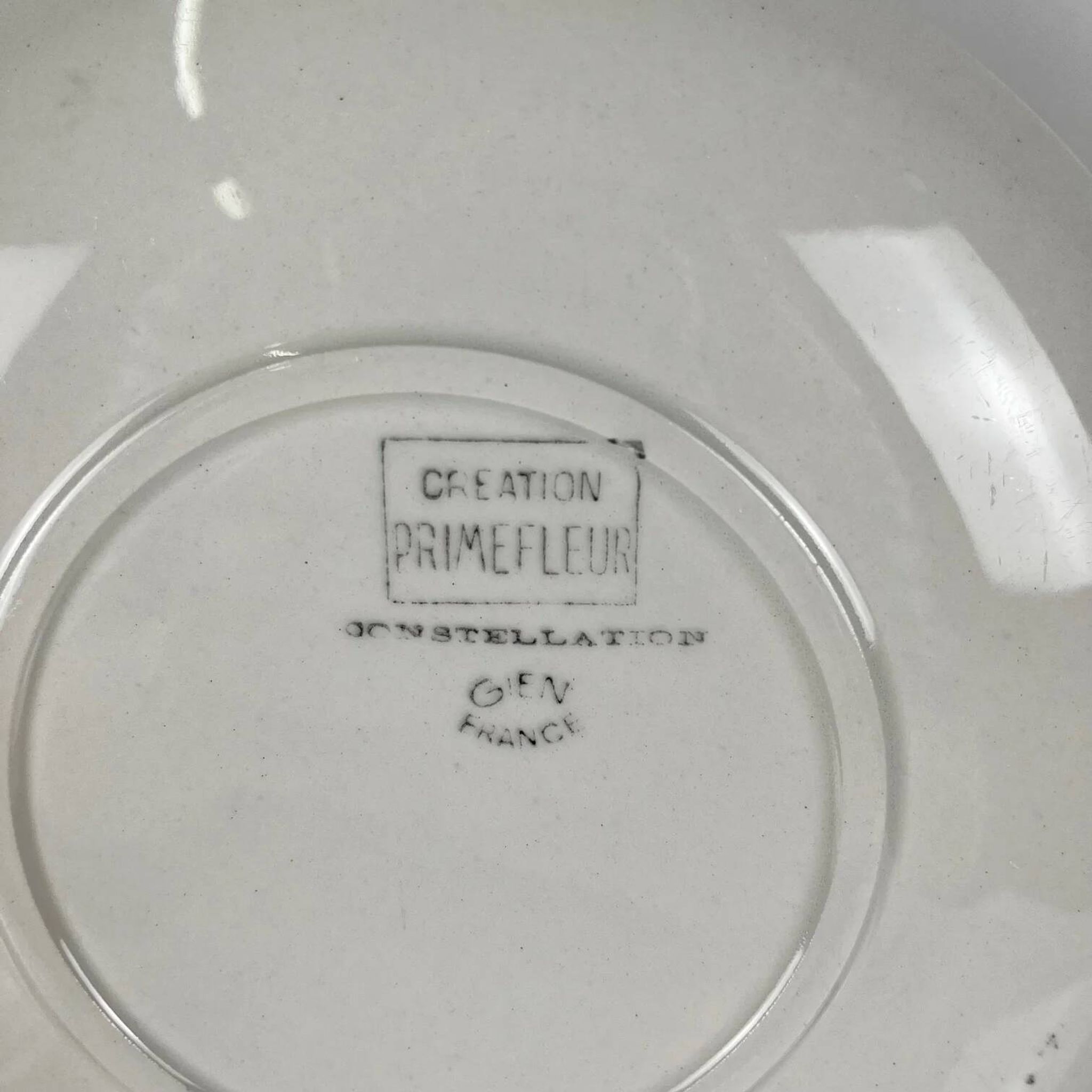 4 assiettes à dessert Gien, création Primefleur, modèle "Constellation", 1950