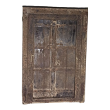 Old wooden door with frame